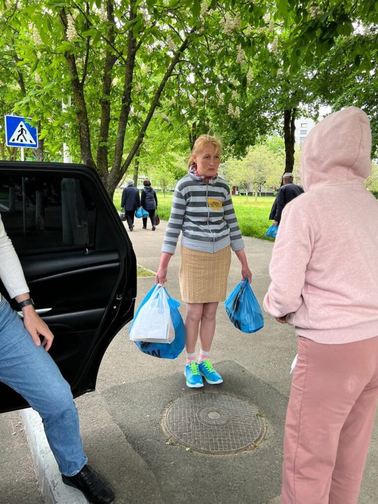 Women distributing supplies.