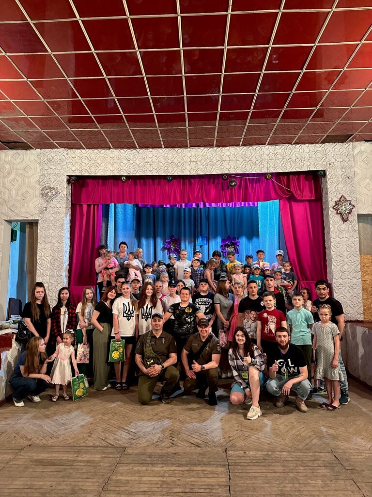 Crowd of children and adults who attended the Ukrainian outreach.