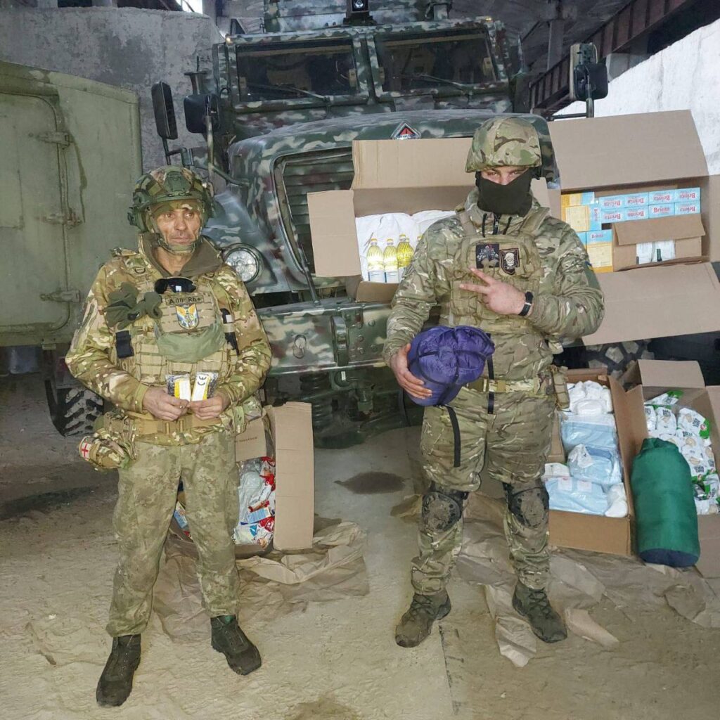 Two military men posing for camera