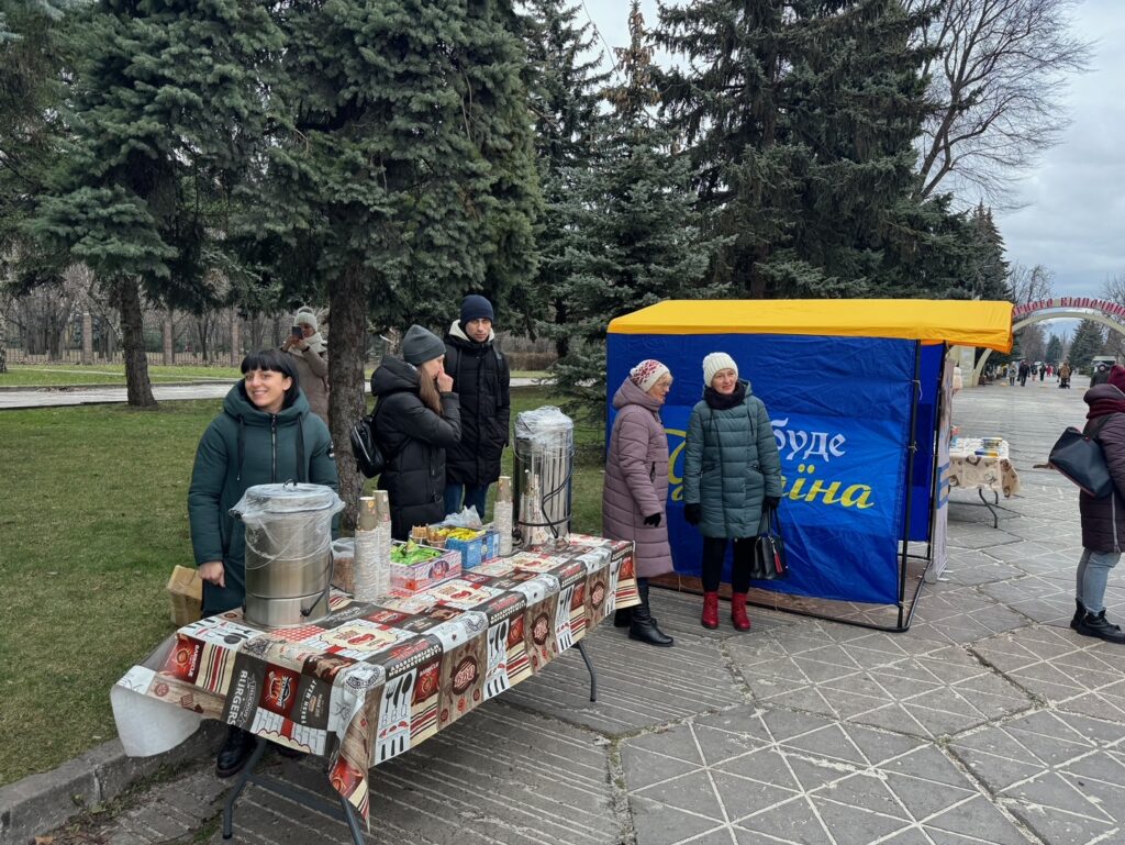Group of people at a coffee stand