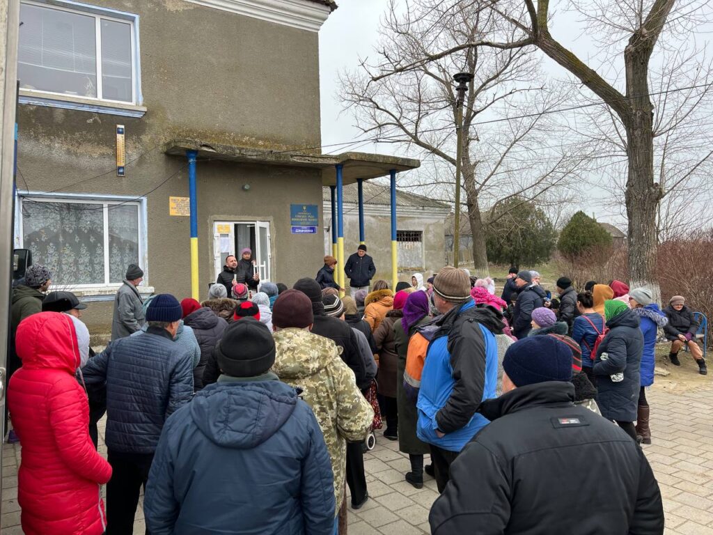 People gathered outside of the mayors office during an outreach in Izmail